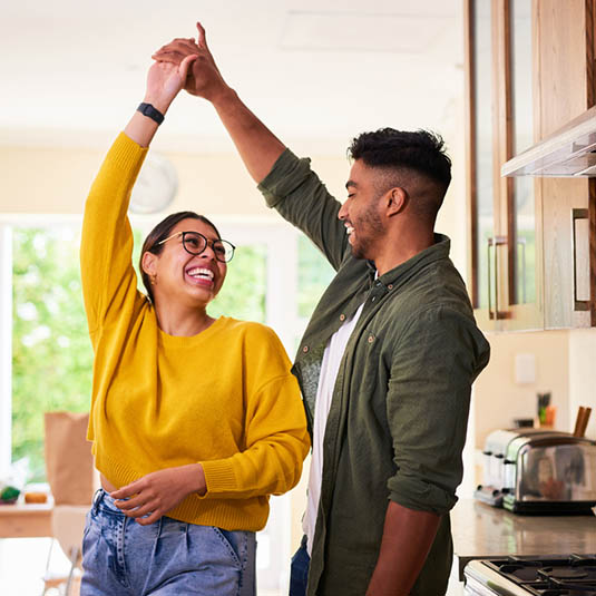 happy couple in the kitchen 